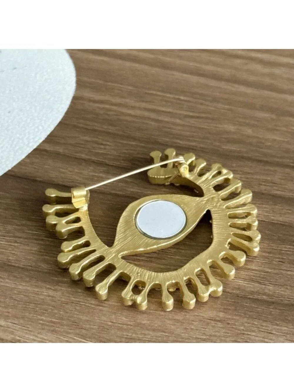 Gold Eye Brooch with Crystals Q674